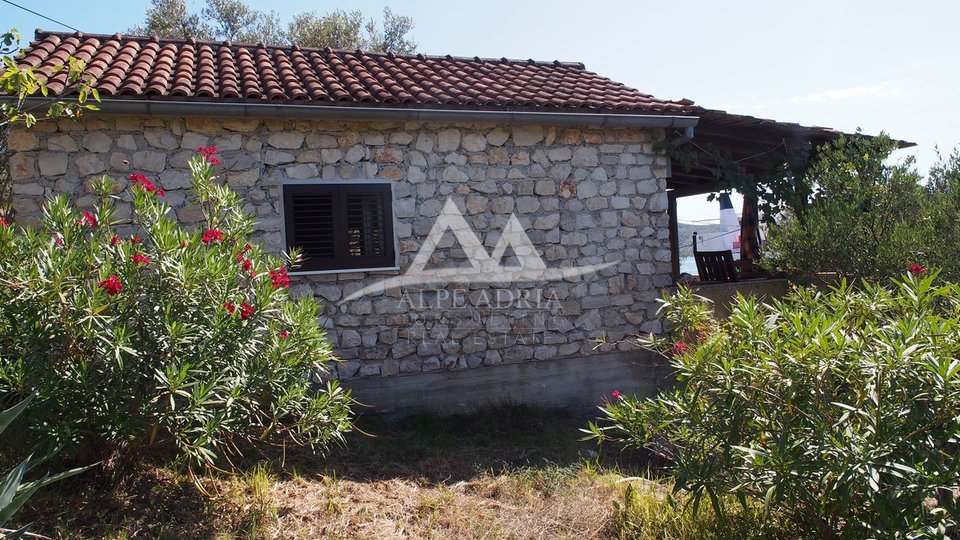 MALA RAVA - CHARMING STONE HOUSE FOR SALE IN THE FIRST ROW TO THE SEA